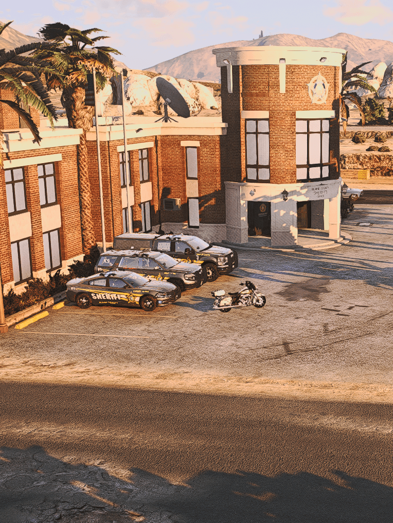 Timberland County sheriff vehicles outside the station